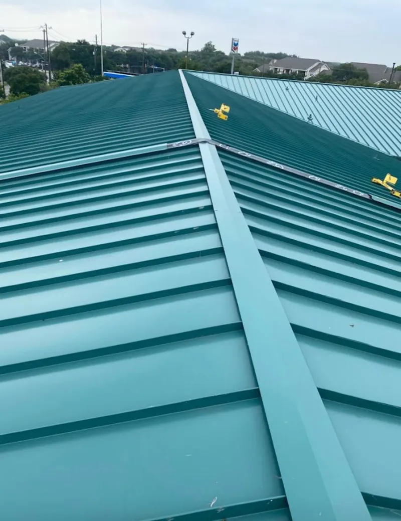 Green commercial metal roof ridge and valley for Metal Roof Repair in Spring Valley